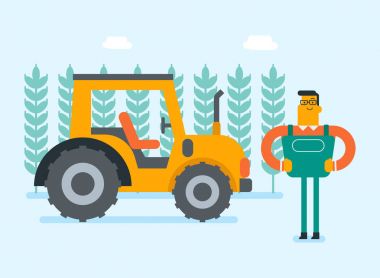 Çiftçi traktör ile kırsal alanda.