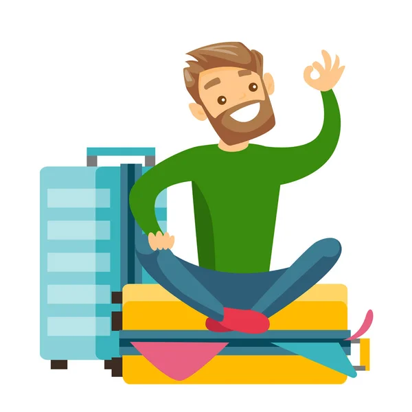 Young caucasian white man sitting on suitcase. — Stock Vector