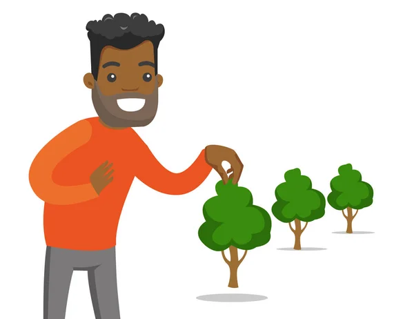 Jovem jardineiro afro-americano planta uma árvore . — Vetor de Stock