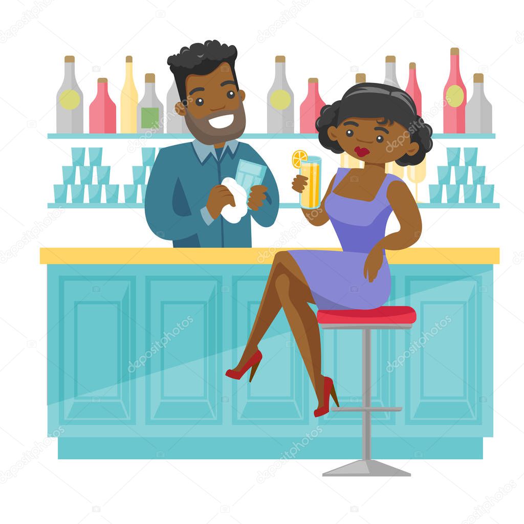African-american woman sitting at the bar counter.
