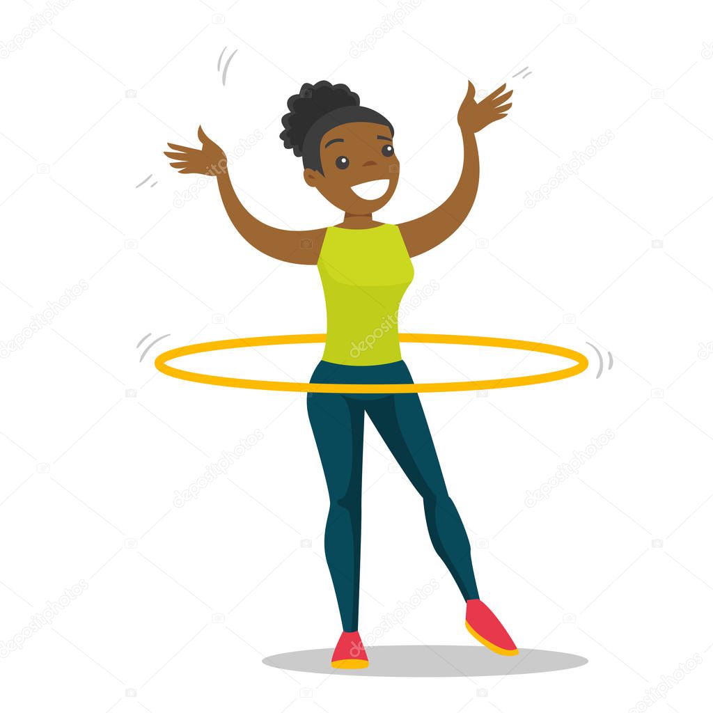 Young african woman doing exercises with hula hoop
