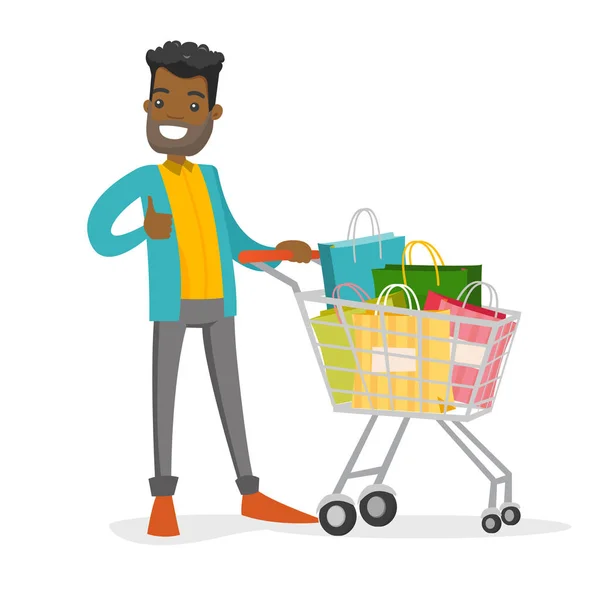 Joven hombre afroamericano con bolsas de compras . — Vector de stock