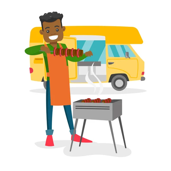 Young man barbecuing meat in front of camper van. — Stock Vector