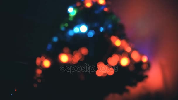 Blurred lights of Christmas tree: bokeh effect — Stock Video