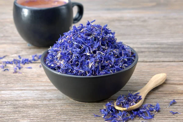 Black Ceramic Bowl Dry Blue Cornflowers Petals Herbal Tea Cup — Stock Photo, Image