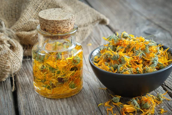 Bottles Calendula Infusion Oil Healthy Marigold Flowers Bowl Canvas Sack — Stock Photo, Image