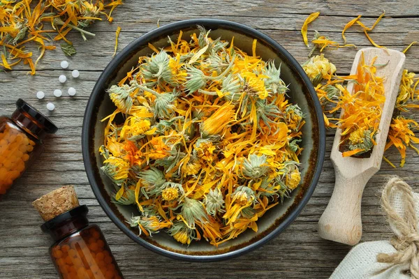 Bottles Homeopathic Calendula Granules Healthy Marigold Flowers Bowl Wooden Table — Stock Photo, Image