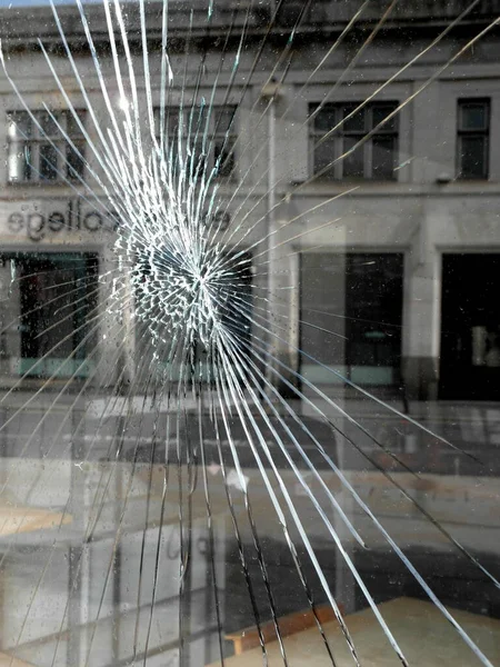 Smashed damaged shopfront business window insurance claim