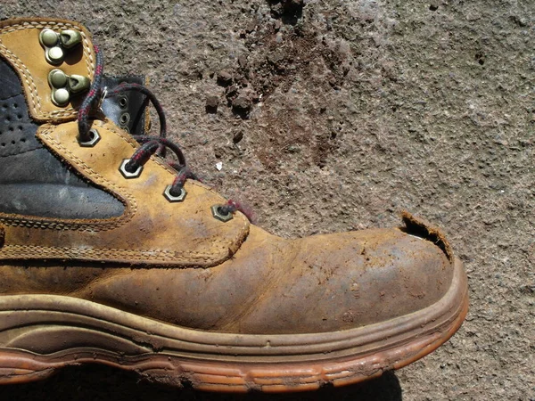 steel toe cap safety boots with damage showing the protection provided.