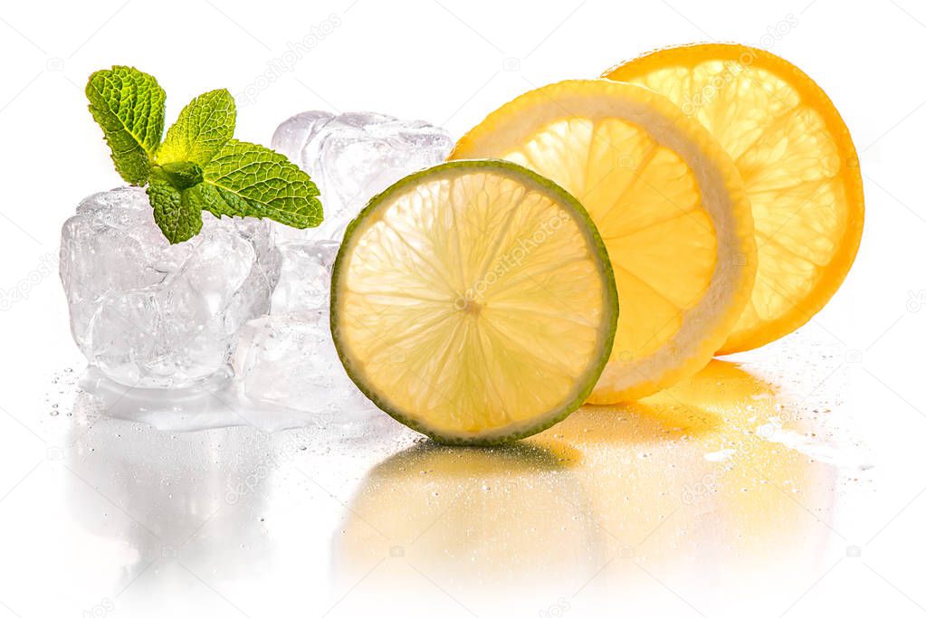 Ice cubes, lime, lemon and orange