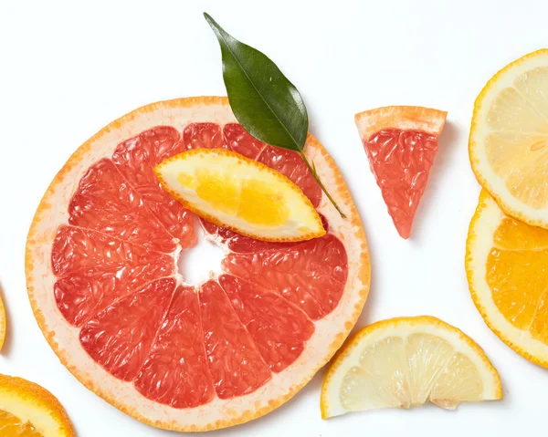 Citrus slices on white background — Stock Photo, Image