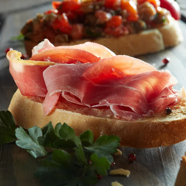 Concept of italian food with bruschetta — Stock Photo, Image