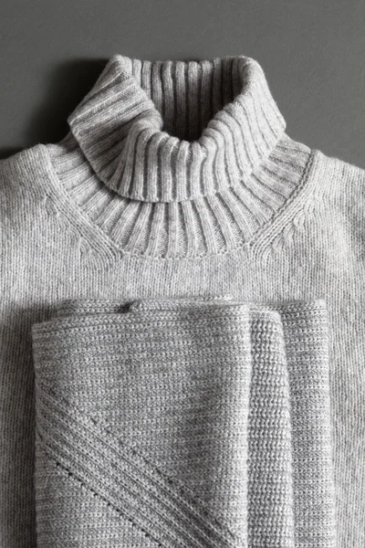Textur des grauen Pullovers — Stockfoto