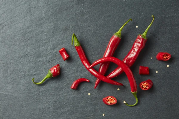 Sliced fresh red chillies isolated — Stock fotografie