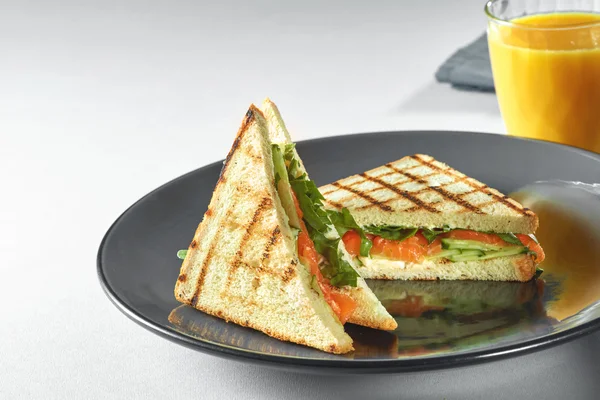 Toast sandwich with salmon — Stock Photo, Image