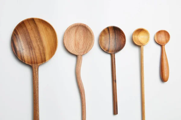 Natural wood texture spoons with difference color. — Stock Photo, Image