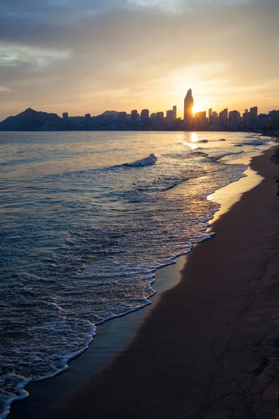 Golden sunset on Poniente beach — Stock Photo, Image