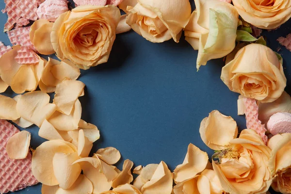 Waffles and rose petals — Stock Photo, Image