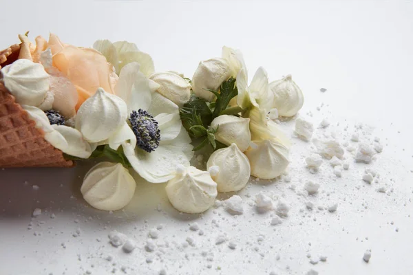 Waffle cone with composition of flowers — Stock Photo, Image