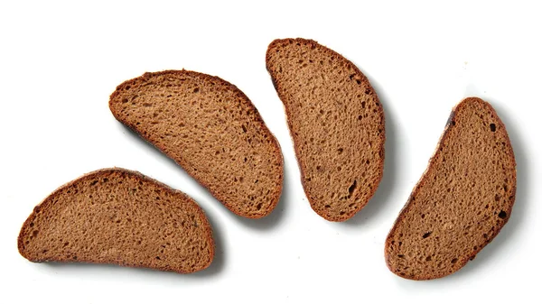 Bruna skivor bröd — Stockfoto