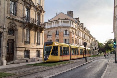 Tram on streets of Reims clipart