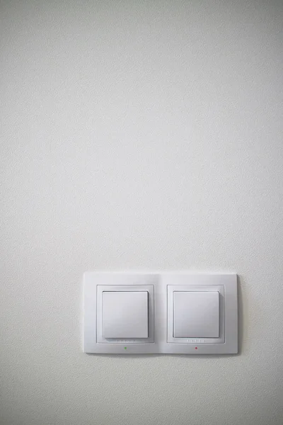 Double White Lighting Switchers Concrete Wall Electrical Power Socket Plug — Stock Photo, Image