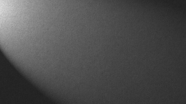 серый фон с легкой теневой текстурой
