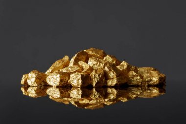  gold nuggets on black background, concept of financing and noble metal clipart