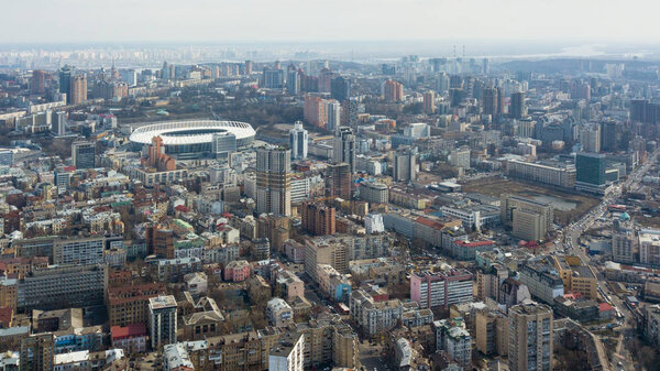 Aerial view of Kyiv city architecture and Olympic Stadium , the national sports complex