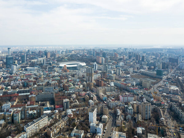 Aerial view of Kyiv city architecture and Olympic Stadium , the national sports complex