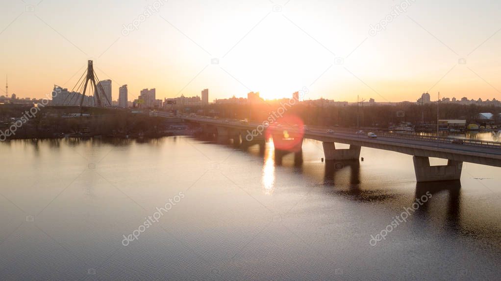 bridge at sunset across the Dnipro River and bridge Kyiv, Ukraine