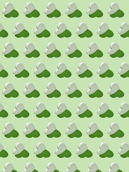 Декоративний Візерунок Гіпсових Вертикальних Стоячих Сердець Світло Зеленому Тлі Твердими — стокове фото