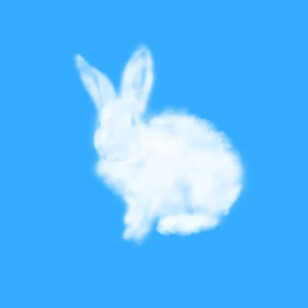 毛茸茸的复活节兔子用白云制成的贺卡 背景是灰暗的蓝天 有复制的空间 节日快乐复活节贺卡 — 图库照片