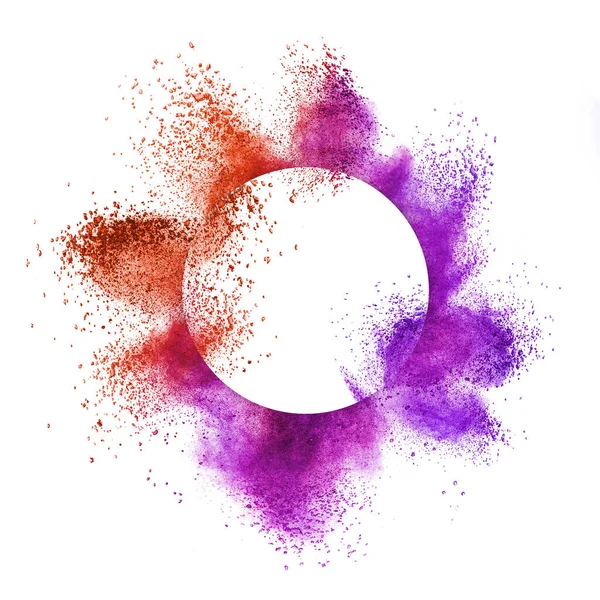 Creative round frame with powder splash around it in red and purple colors on a white background, copy space.
