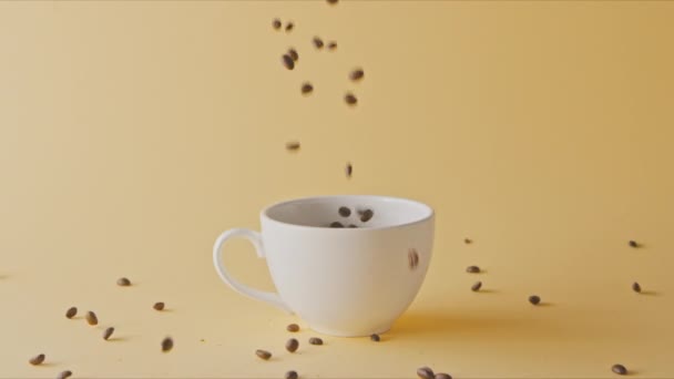 Fragrant Coffee Beans Pouring Cup — Stock Video