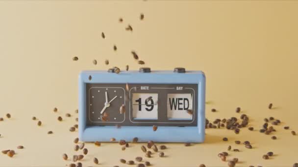 Fragrant Coffee Beans Pouring Vintage Alarm Clock — Stock Video