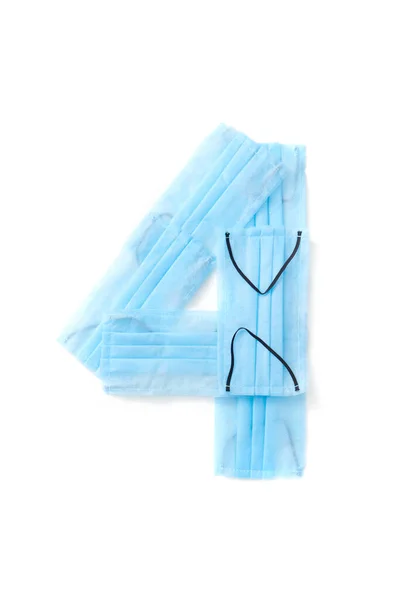 Abbildung Vier Handgefertigte Antibakterielle Blaue Gesichtsmasken Auf Weißem Hintergrund Kopierraum — Stockfoto