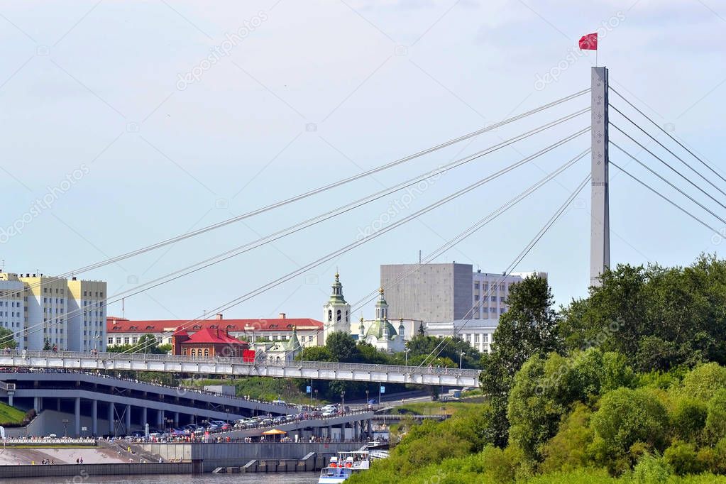 The bridge for pedestrians over the Tura River in Tyumen, Russia