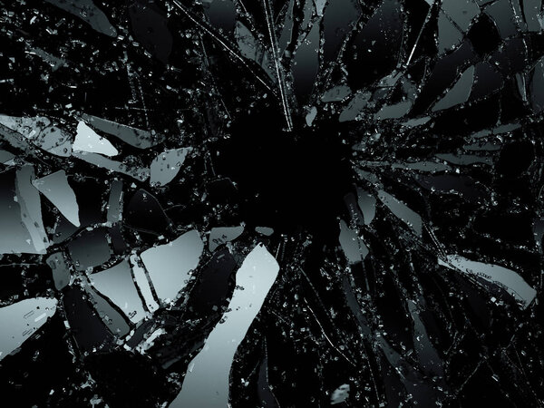 Pieces of destructed Shattered glass on black 