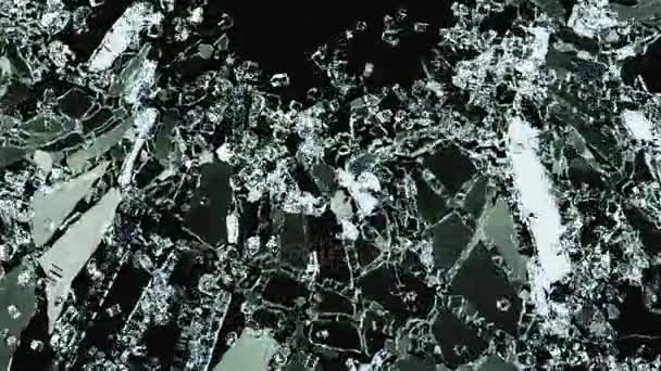 Glass cracking and shattering into small pieces — Stock Video