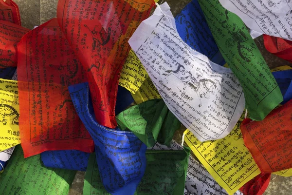 Buddhist colorful prayer flags with printed mantras — Stock Photo, Image