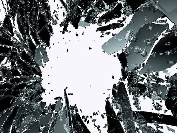 Pieces of splitted or cracked glass on white