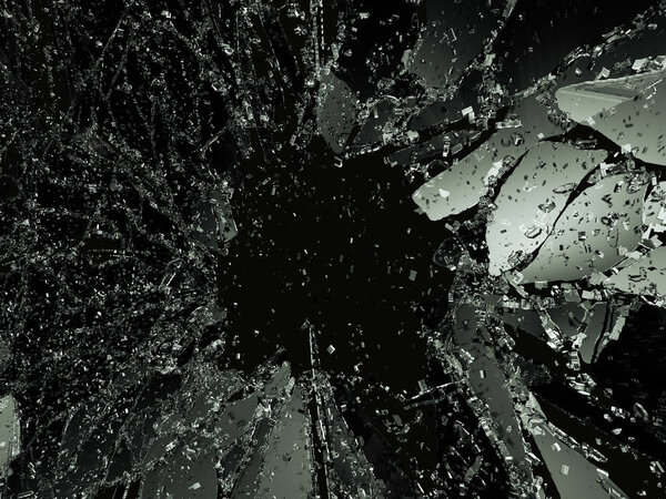 Shattered or demolished glass over black