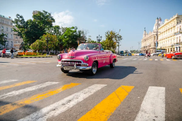 Retro car as taxi with tourist in Havana Cuba — Stok Foto