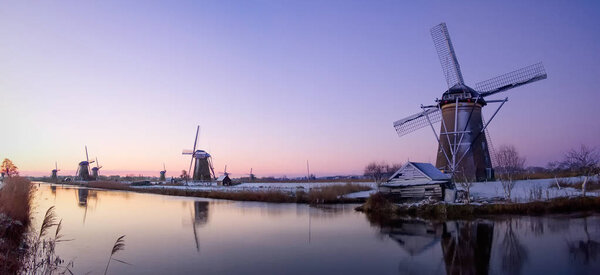 Windmill sunrise in the Netherlands
