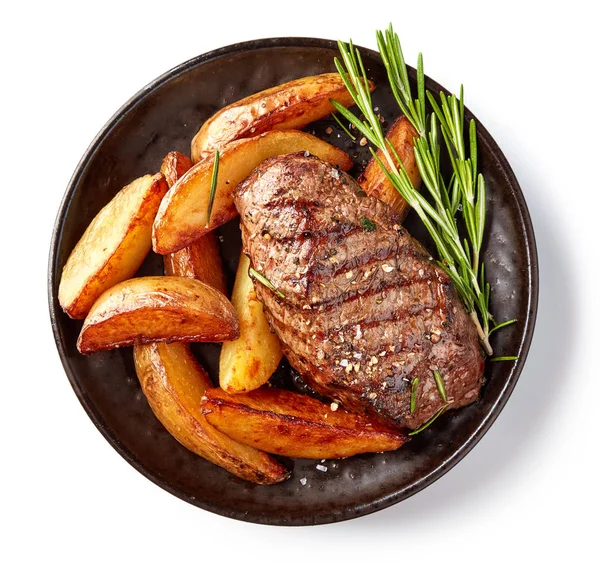 Grilled beef steak and potatoes — Stock Photo, Image
