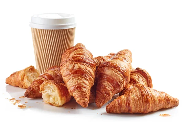 Heap of croissants and paper coffee cup — Stock Photo, Image