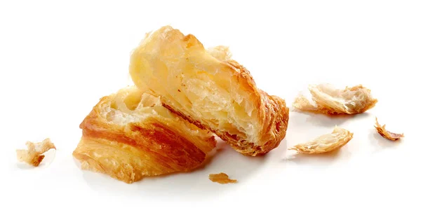 Croissant stukken en kruimels — Stockfoto