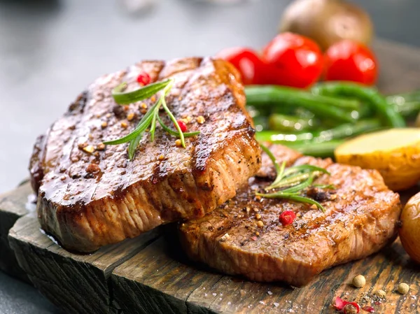 Grilled beef steaks — Stock Photo, Image