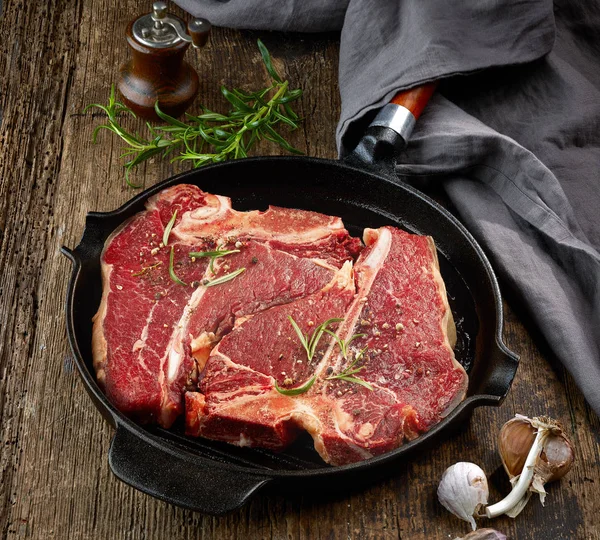 Fresh raw T bone steaks — Stock Photo, Image